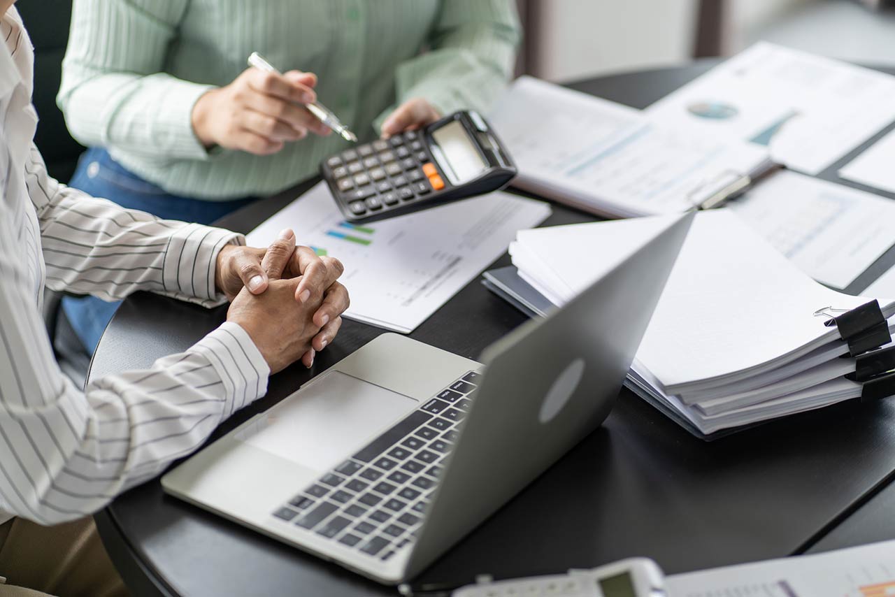 auditor or internal revenue service staff, Business women checking annual financial statements of company